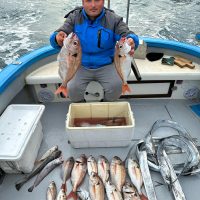 fishing-tour-guide-tropical-catch-golden-snapper-beach